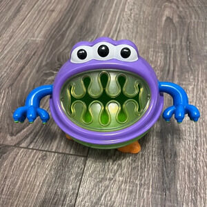 Nuby Snack holder/cup shaped to look like a monster with rubbery teeth 2011